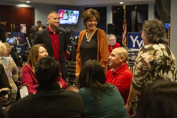 Republican U.S. Rep. Yvette Herrell talks with attendees during her midterm watch party on Tuesday, Nov. 8, 2022, at Picacho Hills Country Club in Las Cruces, N.M. (Las Cruces Sun-News/The Las Cruces Sun News via AP)