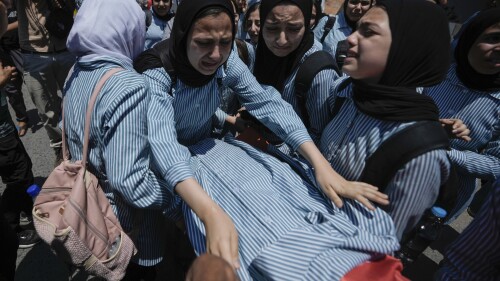 The classmates of 15-year-old Sadeel Naghniyeh carry her body during her funeral in the West Bank Jenin refugee camp Wednesday, June 21, 2023. Naghniyeh died from wounds sustained in an Israeli military raid on Monday that triggered some of the fiercest fighting with Palestinian militants in years. (AP Photo/Majdi Mohammed)