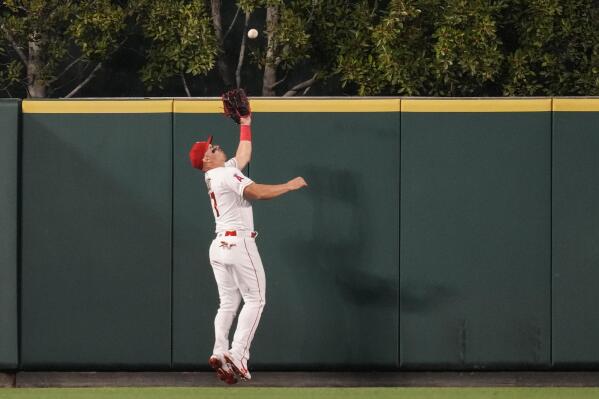 Los Angeles Angels center fielder Mike Trout (27) catches a fly