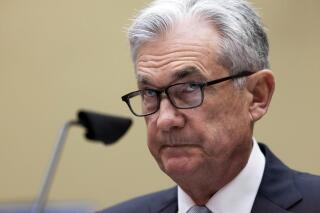 FILE - In this June 22, 2021 file photo, Federal Reserve Board chairman Jerome Powell testifies on the Federal Reserve's response to the coronavirus pandemic during a House Oversight and Reform Select Subcommittee on the Coronavirus hearing on Capitol Hill in Washington. Federal Reserve officials began debating at their June meeting when and how they would reduce the monthly bond purchases that they have used to keep longer-term interest rates in check. (Graeme Jennings/Pool via AP)