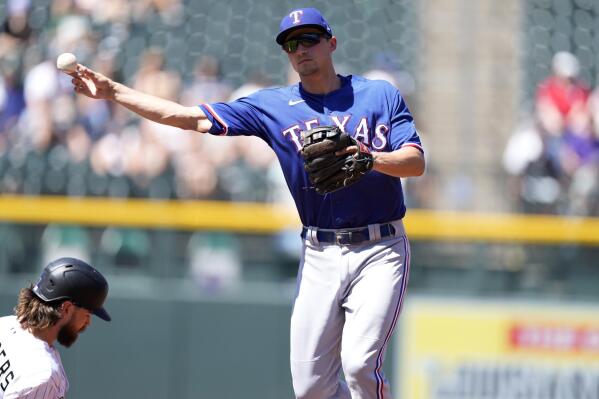 Perez, Lowe, big 2nd inning help Rangers rout Rockies 16-4