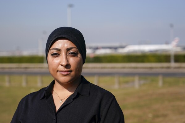 FILE - Maryam al-Khawaja poses for a photograph outside Heathrow airport, in London, Friday, Sept. 15, 2023. The daughter of a long-detained human rights activist in Bahrain said Monday, Feb. 19, 2024, she had been diagnosed with Hodgkin lymphoma, again calling for her father's release. Maryam al-Khawaja again called on Denmark, where both al-Khawajas have citizenship, to do more to free her father, 62-year-old Abdulhadi al-Khawaja.(APPhoto/Alberto Pezzali, File)