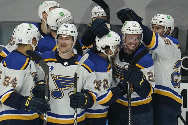 The St. Louis Blues celebrate after scoring in overtime to win 2-1 over the Los Angeles Kings in a hockey game Monday, May 10, 2021, in Los Angeles. The goal was scored by defenseman Justin Faulk (72). (AP Photo/Ashley Landis)