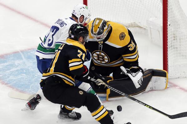 Linus Ullmark finishes the Bruins' win over the Canucks with a