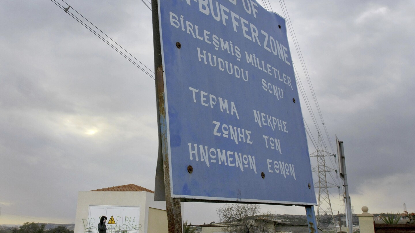 Turkish Cypriots attack UN peacekeepers trying to halt road work inside divided Cyprus’ buffer zone