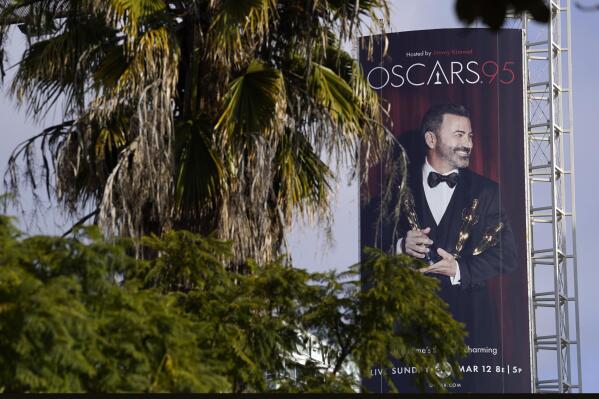An advertisement for Sunday's 95th Academy Awards features host Jimmy Kimmel, Wednesday, March 8, 2023, near the Dolby Theatre in Los Angeles. (AP Photo/Chris Pizzello)