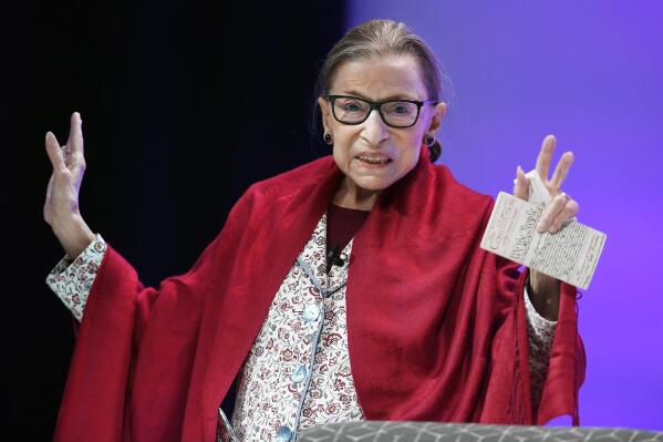 FILE - In this Oct. 3, 2019 file photo, U.S. FILE - Supreme Court Justice Ruth Bader Ginsburg gestures to students before she speaks at Amherst College in Amherst, Mass, on Oct. 3, 2019. Ginsburg is being remembered during ceremonies at the Supreme Court on Friday, March 17, 2023. (AP Photo/Jessica Hill, File)