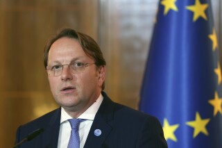 FILE - EU Commissioner for Neighborhood and Enlargement Oliver Varhelyi speaks during a press conference in Tirana, Albania, on Oct. 6, 2023. Varhelyi said Monday Oct. 9, 2023 the bloc is suspending “all payments immediately” to the Palestinians because of what he called the “scale of terror and brutality” during the attacks of Hamas against Israel. (AP Photo/Franc Zhurda, File)