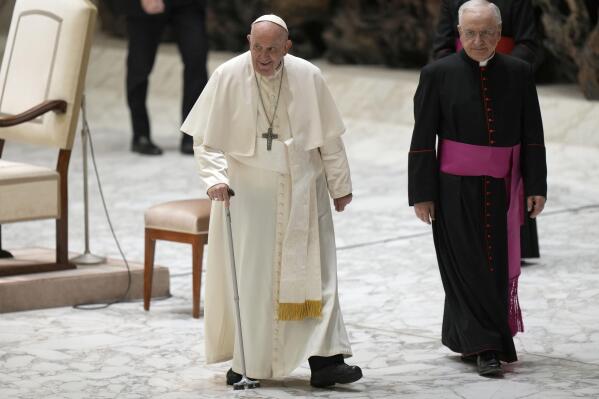 Pope Francis leaves after an audience with the dioceses of Spoleto and Norcia in the Paul VI Hall, at the Vatican, Saturday, May 20, 2023. (AP Photo/Alessandra Tarantino)