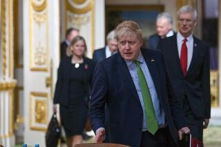 British Prime Minister Boris Johnson arrives for a meeting of the leaders of the the Joint Expeditionary Force (JEF), a coalition of 10 states focused on security in northern Europe, in London, Tuesday, March 15, 2022. (Justin Tallis/Pool Photo via AP)