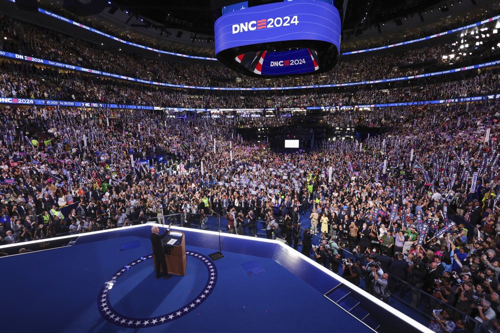 President Joe Biden waves to the crowd during the Democratic National Convention, Monday, Aug. 19, 2024, in Chicago. (Mike Segar/Pool Photo via AP)