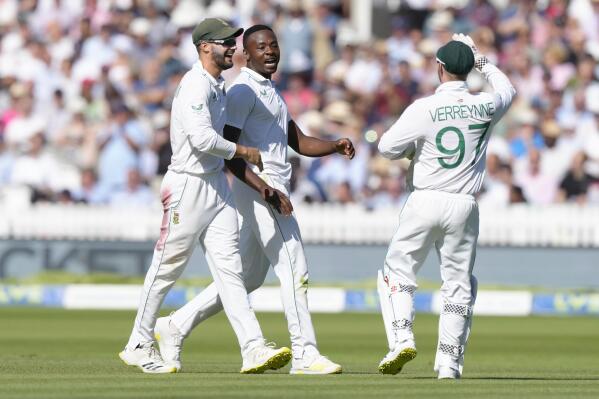 South Africa's Kagiso Rabada celebrates taking the wicket of England's Ben Stokes during the third day of the test match between England and South Africa at Lord's cricket ground in London, Friday, Aug. 19, 2022. (AP Photo/Kirsty Wigglesworth)