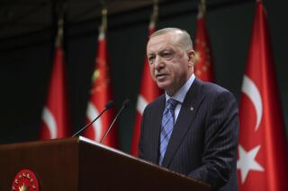 Turkey's President Recep Tayyip Erdogan talks following his cabinet meeting in Ankara, Turkey, Monday, May 17, 2021. Erdogan slammed U.S President Joe Biden, accusing him of "writing history with his bloody hands" following reports of a multi-million dollar weapons sale to Israel by his administration. Erdogan also said Jerusalem should be administered by an international commission made up of Jewish, Christian and Muslim representatives. (Mustafa Kamaci/Turkish Presidency via AP)