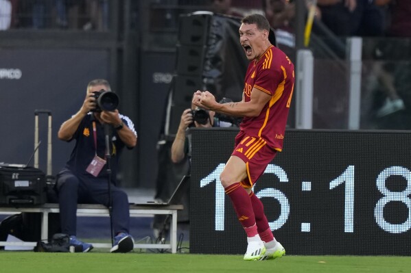 Roma's Andrea Belotti celebrates after scoring his side's first goal during the Serie A soccer match between Roma and Salernitana, at Rome's Olympic Stadium, Sunday, Aug. 20, 2023. (AP Photo/Andrew Medichini)