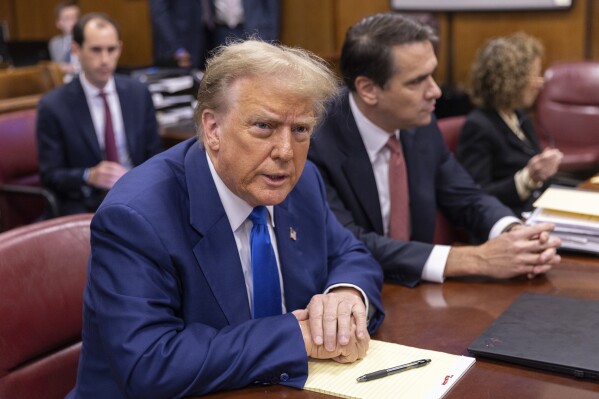 Former President Donald Trump appears at Manhattan criminal court before his trial in New York, Friday,, May 3, 2024. (Jeenah Moon/Pool Photo via AP)