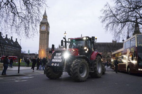 Farmers take part in a tractor 