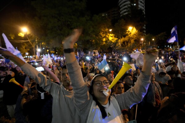 Supporters of presidential candidate Bernardo Arevalo celebrate after preliminary results showed him the victor in a presidential run-off election in Guatemala City, Sunday, Aug. 20, 2023. Arevalo appeared to be the 