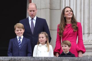 FILE - Britain's Prince William, Kate, Duchess of Cambridge, Prince George, Princess Charlotte and Prince Louis, appear on the balcony of Buckingham Palace, during the Platinum Jubilee Pageant outside Buckingham Palace in London, June 5, 2022. Prince William and his wife, Kate, will relocate their family from central London to more rural dwellings in Windsor, and all three of their children will attend the same private school near their new home, palace officials said Monday Aug. 22, 2022. (Chris Jackson/PA via AP, File)