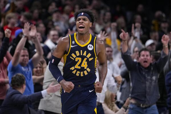 Indiana Pacers guard Buddy Hield (24) reacts as the Pacers took the lead against the Chicago Bulls during the second half of an NBA basketball game in Indianapolis, Tuesday, Jan. 24, 2023. (AP Photo/Michael Conroy)