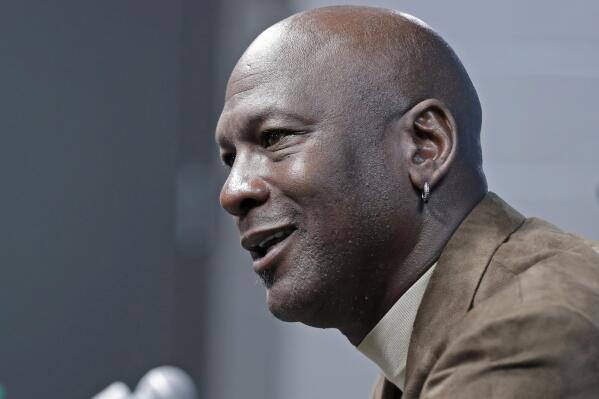 FILE - In this Feb. 12, 2019 file photo, Charlotte Hornets owner Michael Jordan speaks to the media about hosting the NBA All-Star basketball game during a news conference in Charlotte, N.C.  The Supreme Court said Monday it won’t step in to referee a copyright dispute between Nike and a photographer who took a well-known image of basketball great Michael Jordan. That means lower court rulings for the athletic apparel maker will stand. (AP Photo/Chuck Burton)