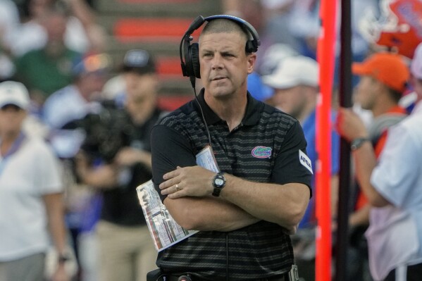 Embattled Florida coach Billy Napier clarifies comments involving 'some guy  in his basement' | AP News