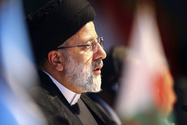 Iran President Ebrahim Raisi addresses the 15th BRICS Summit, in Johannesburg, South Africa, Thursday, Aug. 24, 2023. The BRICS leaders announced that they would welcome six new members in January 2024: Iran, Argentina, Egypt, Ethiopia, Saudi Arabia and the United Arab Emirates.(Kim Ludbrook/Pool via AP)