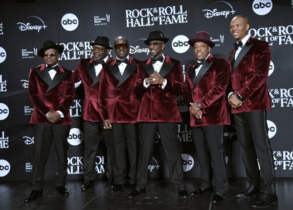 Ricky Bell, from left, Bobby Brown, Johnny Gill, Ralph Tresvant, Michael Bivins, and Ronnie DeVoe of New Edition pose in the press room during the Rock & Roll Hall of Fame Induction Ceremony on Friday, Nov. 3, 2023, at Barclays Center in New York. (Photo by Evan Agostini/Invision/AP)