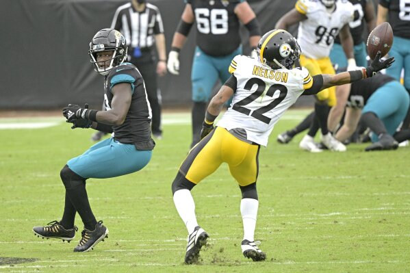 Pittsburgh Steelers cornerback Steven Nelson (22) tries to incept a pass intended for Jacksonville Jaguars wide receiver Chris Conley (18) during the first half of an NFL football game, Sunday, Nov. 22, 2020, in Jacksonville, Fla. (AP Photo/Phelan M. Ebenhack)
