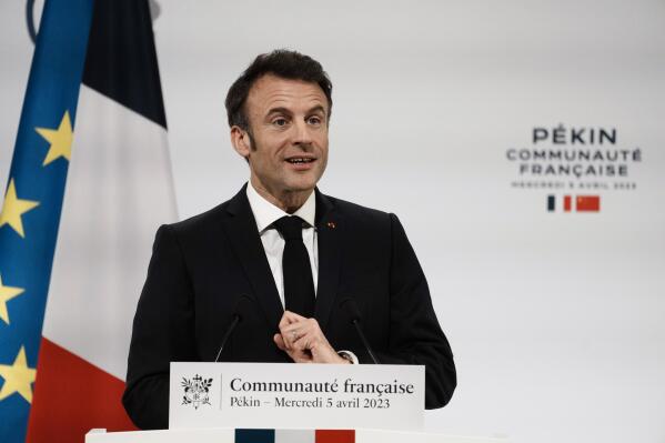French President Emmanuel Macron gives a speech as he meets the French community, in Beijing, China, Wednesday, April 5, 2023. Macron will have to muster all his diplomatic adeptness and political acumen on a three-day state visit to China where the war in Ukraine will be front and center. (AP Photo/Thibault Camus)