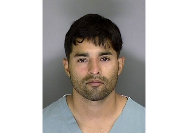 In this Sunday, June 7, 2020, booking mugshot courtesy Santa Cruz Sheriff's Office shows 32-year-old suspect Steven Carrillo, an active-duty U.S. Air Force sergeant arrested on suspicion of fatally shooting Santa Cruz Sheriff's Sgt. Damon Gutzwiller, 38, and wounding two other officers Saturday. (Santa Cruz Sheriff's Office via AP)