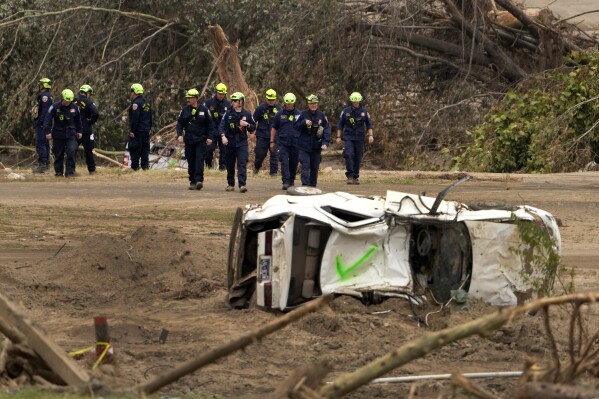 Personnel from Urban Search and Rescue Utah Task Force 1 work in the aftermath of Hurricane Helene, Oct. 4, 2024, in Erwin, Tenn. (AP Photo/Jeff Roberson, File)