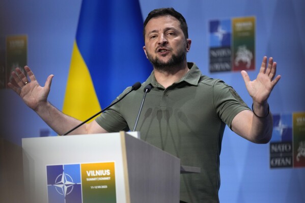 Ukraine's President Volodymyr Zelenskyy addresses a media conference at a NATO summit in Vilnius, Lithuania, Wednesday, July 12, 2023. The United States and other major industrialized nations are pledging long-term security assistance for Ukraine as it continues to fight Russia's invasion. (AP Photo/Pavel Golovkin)