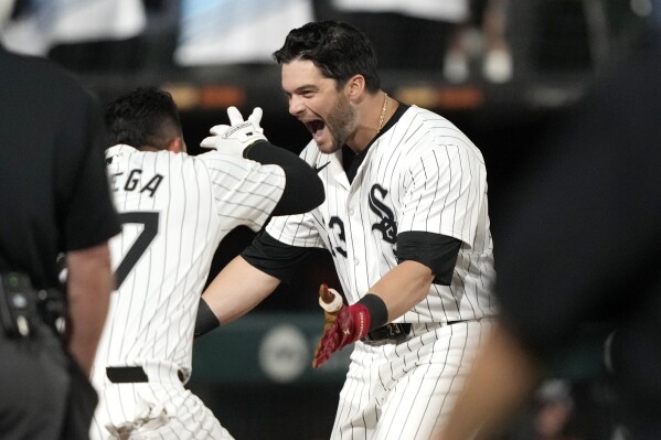 Benintendi hits 2nd home of game in 10th, White Sox beat Rays 8-7 for 5th win of season.