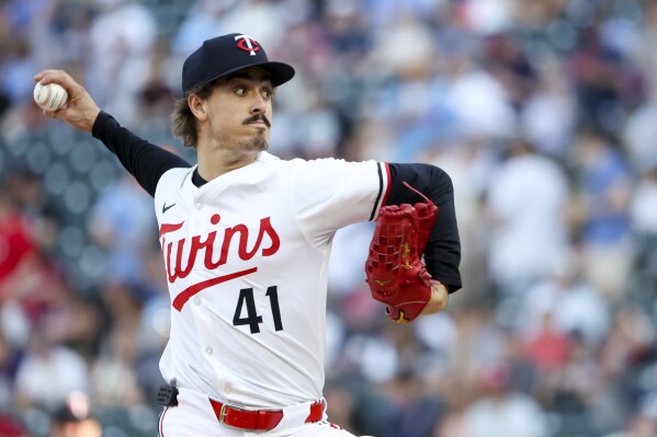 Minnesota Twins pitcher Joe Ryan (41) throws to the San Francisco Giants during the first inning of a baseball game Saturday, May 10, 2025, in Minneapolis. (AP Photo/Ellen Schmidt)