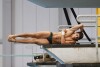 Diego Balleza, a 10-meter Olympic diver, trains in Monterrey, Mexico, Tuesday, June 13, 2023. Because of a lack of financial resources ahead of next year's Paris Olympics, Balleza, who was fourth in synchronized diving on the 10-meter platform at the Tokyo Olympics, chose to join OnlyFans, a site where content creators upload images and videos, some of them explicit. (AP Photo/Jorge Mendoza)