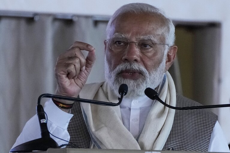 Indian Prime Minister Narendra Modi speaks during the inauguration of the Sabarmati Mahatma Gandhi Ashram reconstruction project in Ahmedabad, India, Tuesday, March 12, 2024. (AP Photo/Ajit Solanki)