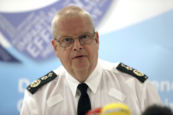 Police Service of Northern Ireland (PSNI) Chief Constable Simon Byrne speaks, during a press conference after an emergency meeting of the Northern Ireland Policing Board at James House in Belfast, Northern Ireland, Thursday, Aug. 10, 2023, following a data breach. Northern Ireland’s top police officer has apologized for what he described as an “industrial scale” data breach, in which the personal information of more than 10,000 officers and staff was released to the public. (Liam McBurney/PA via AP)
