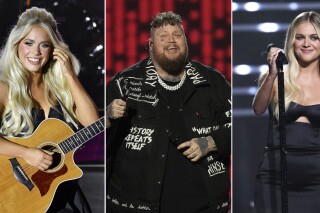 This combination of photos shows country music stars Megan Moroney, left, performing April 2, 2023, in Austin, Texas, Jelly Roll performing Feb. 2, 2024, in Los Angeles, center, and Kelsea Ballerini performing Sept. 11, 2023, in Newark, N.J. (AP Photo)