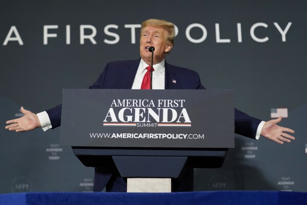 FILE - Former President Donald Trump speaks at an America First Policy Institute agenda summit at the Marriott Marquis in Washington, July 26, 2022. A group trying to lay the groundwork for a second Trump administration if the former president wins in November is out with a new policy book that aims to articulate an "America First" national security agenda. (AP Photo/Andrew Harnik, File)