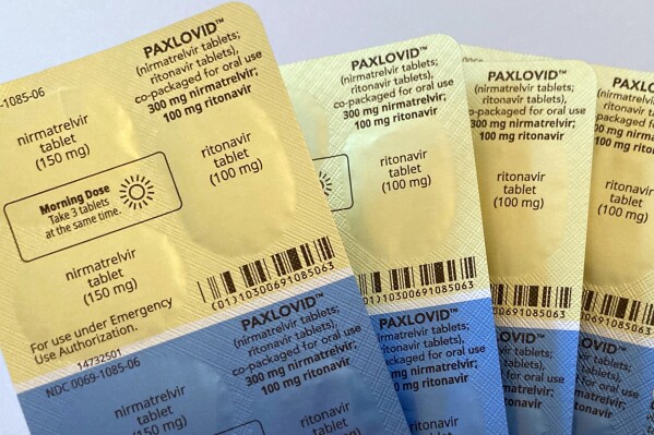 FILE - Doses of the anti-viral drug Paxlovid are displayed in New York, Aug. 1, 2022. The COVID-19 treatments millions of have taken for free from the federal government will enter the private market next week with a hefty price tag. Pharmaceutical giant Pfizer is setting the price for a five-day treatment of Paxlovid at $1,390, but Americans can still access the pills at no cost, for now. Millions of free, taxpayer-funded courses of the pills will remain at pharmacies, hospitals and doctor’s offices across the country, U.S. Health and Human Services officials said Friday, Oct. 27, 2023. (AP Photo/Stephanie Nano, File)