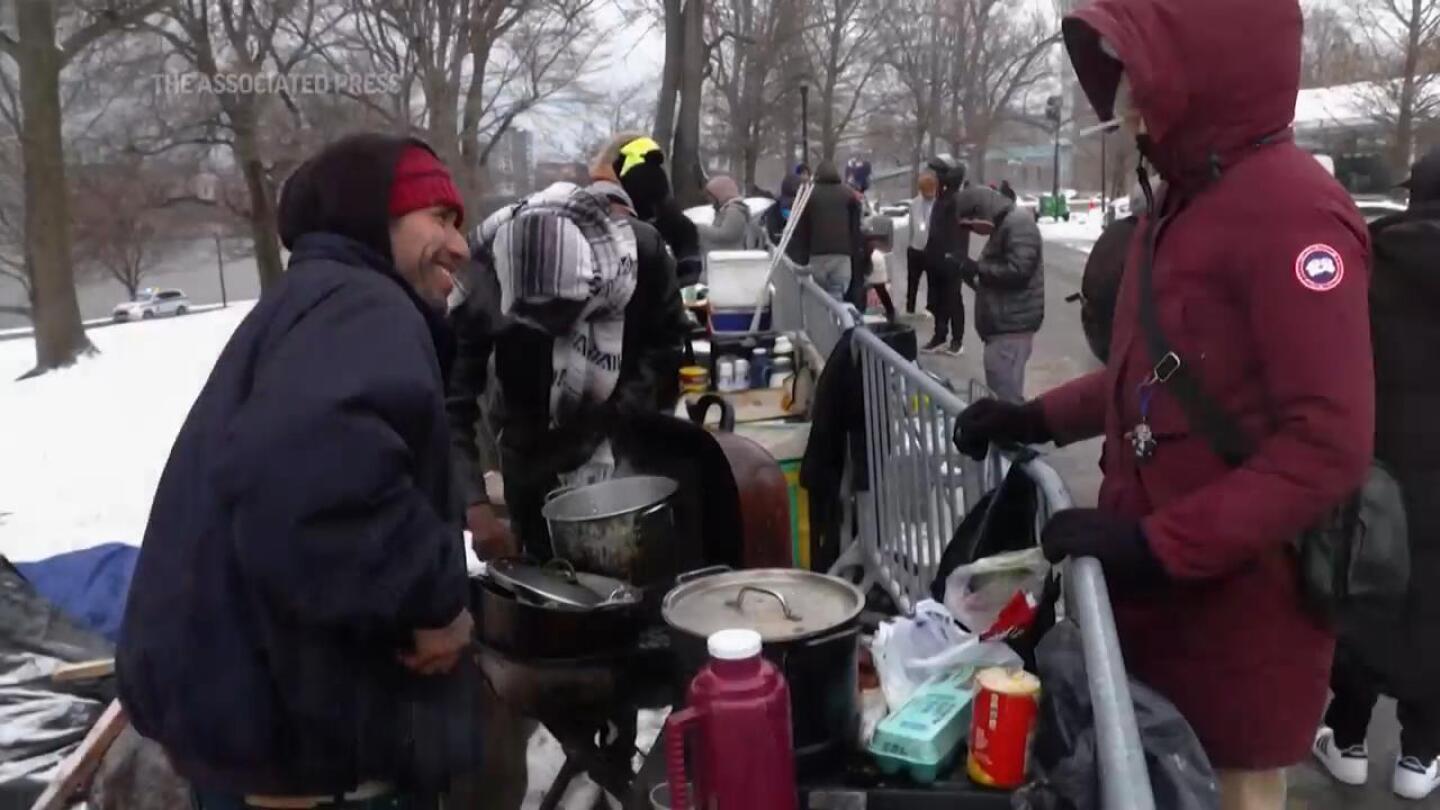 A tent camp is growing outside New York City's largest migrant shelter ...