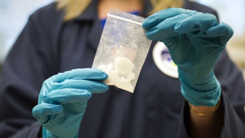 FILE - A bag of 4-fluoro isobutyryl fentanyl which was seized in a drug raid is displayed at the Drug Enforcement Administration (DEA) Special Testing and Research Laboratory in Sterling, Va., on Aug. 9, 2016. China on Friday, July 7, 2023, insisted it is up to the U.S. to “create necessary conditions” for anti-drugs cooperation, following complaints from Washington that Beijing has ignored its calls for a crackdown on precursor chemicals for the highly addictive painkiller fentanyl. (AP Photo/Cliff Owen, File)