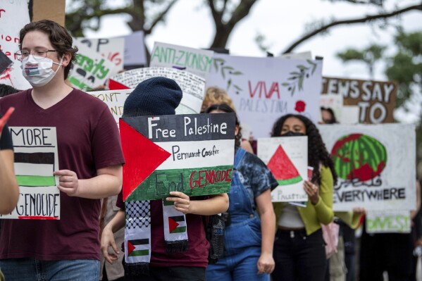 Texas A&M students and members of Texas A&M Young Democratic Socialists of America participate in a pro-Palestinian protest in Rudder Plaza on campus, Tuesday, April 23, 2024, in College Station, Texas. (Meredith Seaver/College Station Eagle via AP)