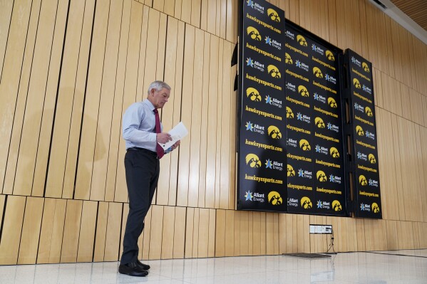 Iowa head coach Kirk Ferentz waits to speak at a news conference, Tuesday, Oct. 31, 2023, in Iowa City, Iowa. Iowa interim athletic director Beth Goetz announced on Monday that Ferentz's son, Brian, would not return as offensive coordinator next year. (AP Photo/Charlie Neibergall)