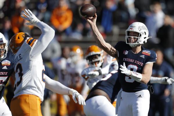 Fresno State quarterback Jake Haener (9) throws against UTEP during the first half of the New Mexico Bowl NCAA college football game Saturday, Dec. 18, 2021, in Albuquerque, N.M. (AP Photo/Andres Leighton)