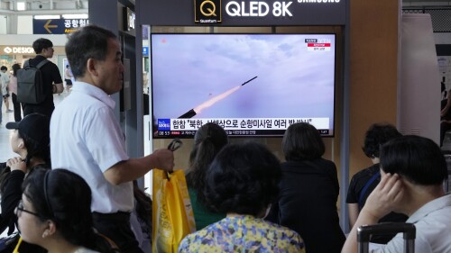 A TV screen shows a file image of North Korea's missile launch during a news program at the Seoul Railway Station in Seoul, South Korea, Saturday, July 22, 2023. North Korea fired several cruise missiles toward its western sea Saturday, South Korea's military said, marking the second launch event this week apparently in protest of the docking of a nuclear-armed U.S. submarine in South Korea. (AP Photo/Ahn Young-joon)