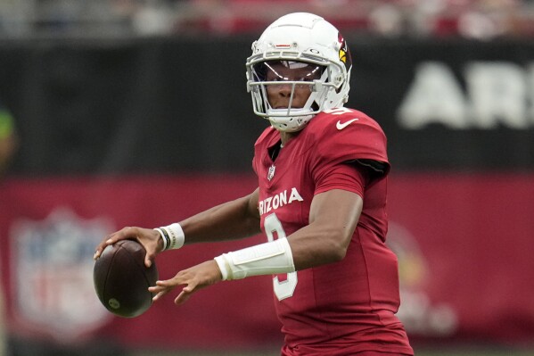 Dallas Cowboys quarterback Dak Prescott looks to pass during the first half  of an NFL football game against the New York Jets, Sunday, Sept. 17, 2023  in Arlington, Texas. (AP Photo/Sam Hodde