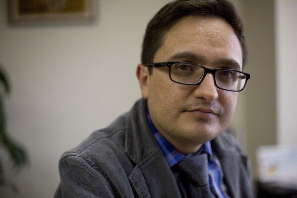 FILE - In this April 3, 2019 file photo, Juan Francisco Sandoval, Guatemala's lead prosecutor against impunity, poses for a photo during an interview in Guatemala City. Sandoval, the former anti-corruption prosecutor whose ouster led the U.S. to reduce cooperation with Guatemala's legal system, said on Sept. 14, 2023 that the US government has granted him political asylum two years after he went into exile due to threats stemming from his investigations. (AP Photo/Moises Castillo, File)