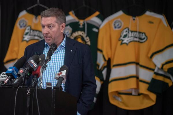 FILE - Former NHL player Sheldon Kennedy speaks at Elgar Petersen Arena following a vigil for the Humboldt Broncos junior hockey team in Humboldt, Saskatchewan, Monday, April 9, 2018. Kennedy's Respect Group has partnered with the NHL for a training program designed to help prevent bullying, abuse, harassment and discrimination. The training for league and club employees is slated to begin in March. (Liam Richards/The Canadian Press via AP, File)