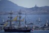The Belem, the three-masted sailing ship which is carrying the Olympic flame, is accompanied by other boats approaching Marseille, southern France, Wednesday, May 8, 2024. After leaving Marseille, a vast relay route is undertaken before the torch odyssey ends on July 27 in Paris. The Paris 2024 Olympic Games will run from July 26 to Aug.11, 2024. (AP Photo/Daniel Cole)